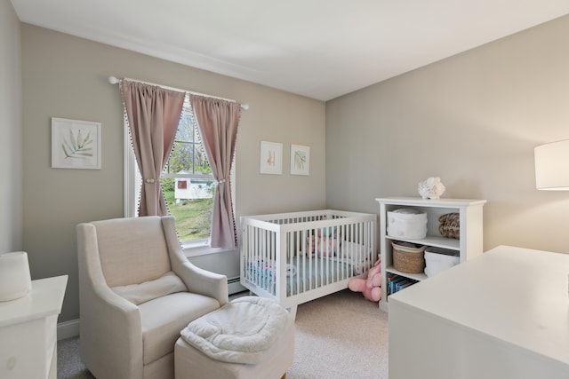 carpeted bedroom with baseboard heating