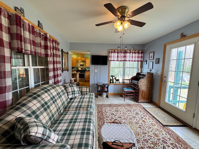242 Bottle Lake Rd, Springfield, ME 04487 - living area featuring baseboards and ceiling fan