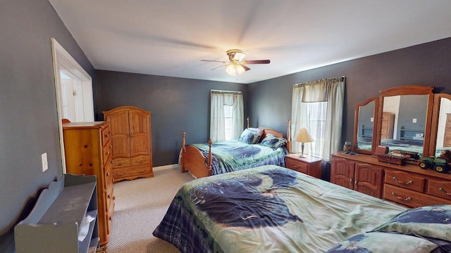 242 Bottle Lake Rd, Springfield, ME 04487 - carpeted bedroom with baseboards and a ceiling fan
