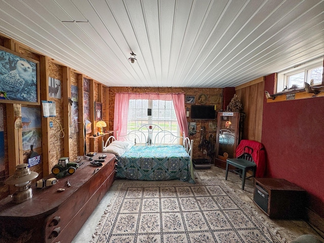 242 Bottle Lake Rd, Springfield, ME 04487 - bedroom with wooden ceiling, wood walls, and multiple windows