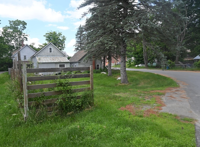 12 Preble St, Bingham, ME 04920 - view of front of property featuring curved driveway and stone siding