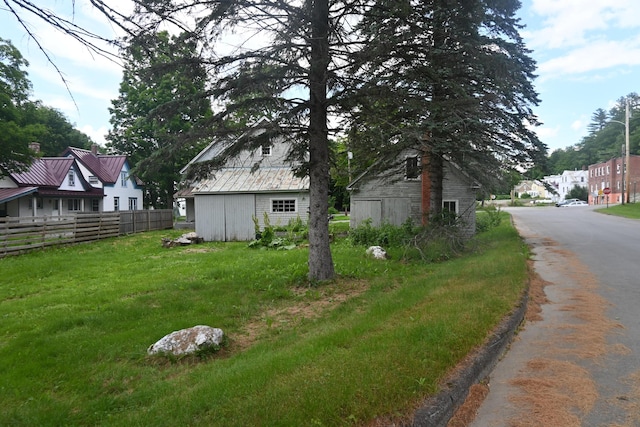 12 Preble St, Bingham, ME 04920 - view of yard featuring an outdoor structure and a residential view