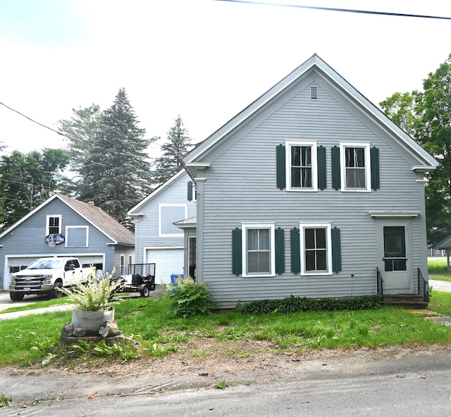 12 Preble St, Bingham, ME 04920 - view of front of home featuring a garage and entry steps