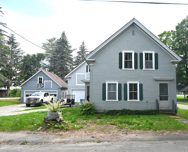 12 Preble St, Bingham, ME 04920 - view of front of property with a garage and entry steps