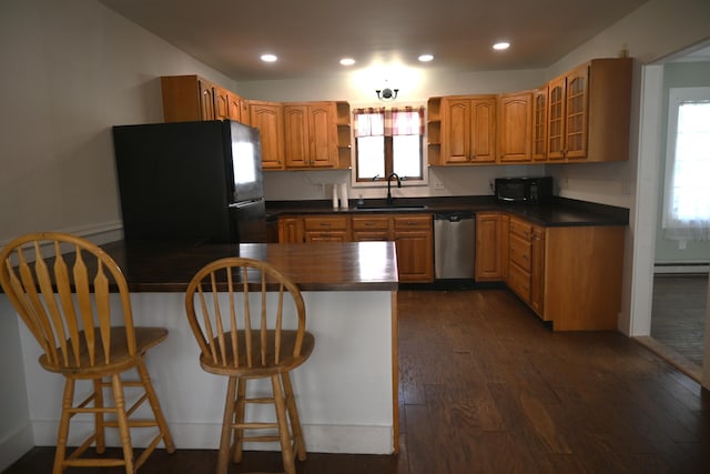 12 Preble St, Bingham, ME 04920 - kitchen featuring black appliances, open shelves, dark countertops, a peninsula, and dark wood-type flooring