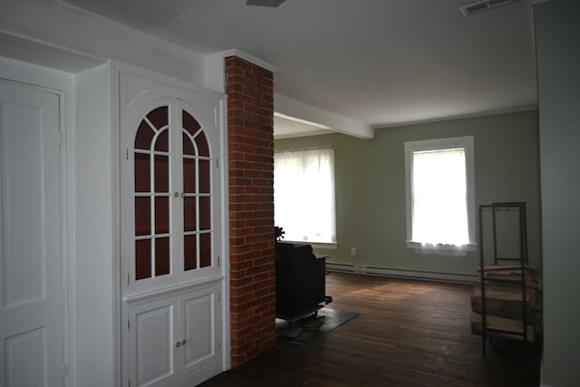 12 Preble St, Bingham, ME 04920 - hall with a baseboard heating unit and wood finished floors