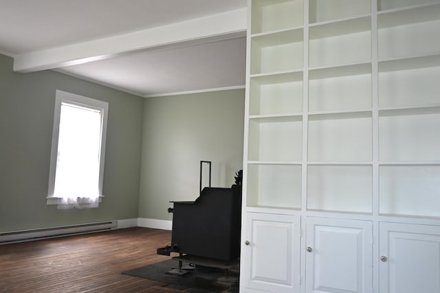 12 Preble St, Bingham, ME 04920 - unfurnished office featuring baseboard heating, dark wood-style flooring, beam ceiling, and ornamental molding