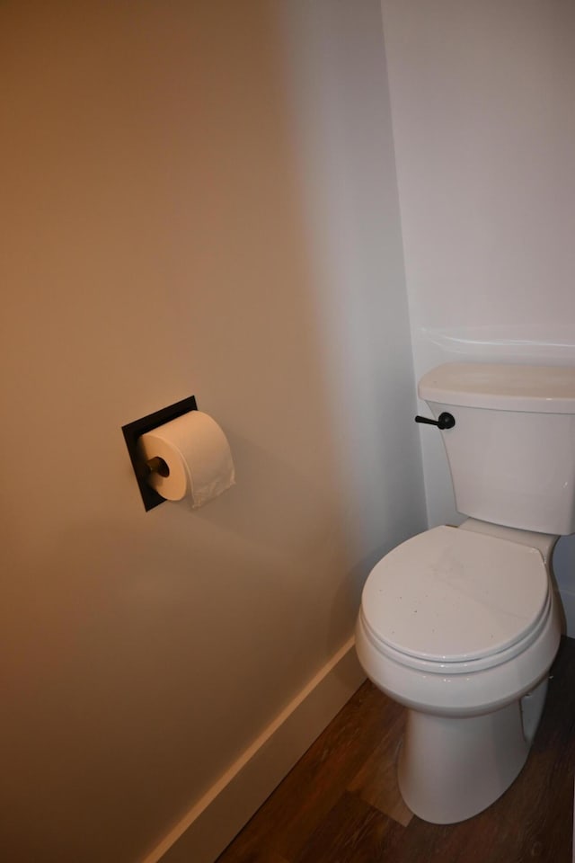 12 Preble St, Bingham, ME 04920 - bathroom with wood finished floors and toilet
