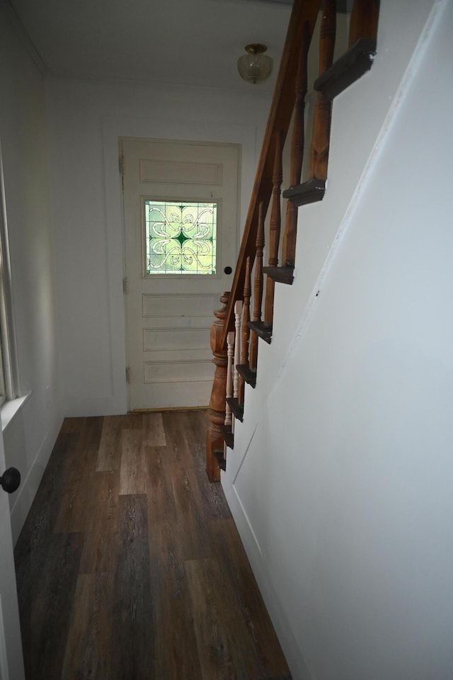 12 Preble St, Bingham, ME 04920 - doorway to outside featuring wood finished floors and stairs