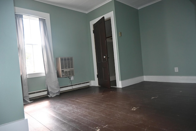 12 Preble St, Bingham, ME 04920 - unfurnished room featuring wood-type flooring, ornamental molding, and baseboard heating