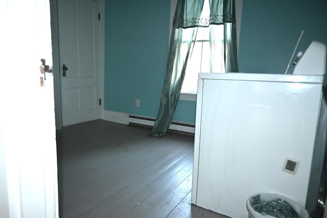12 Preble St, Bingham, ME 04920 - foyer with baseboard heating and wood-type flooring