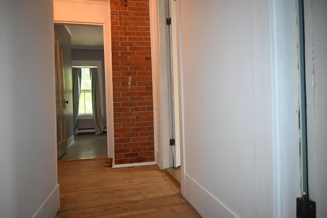 12 Preble St, Bingham, ME 04920 - hallway featuring light wood-type flooring, baseboard heating, and crown molding