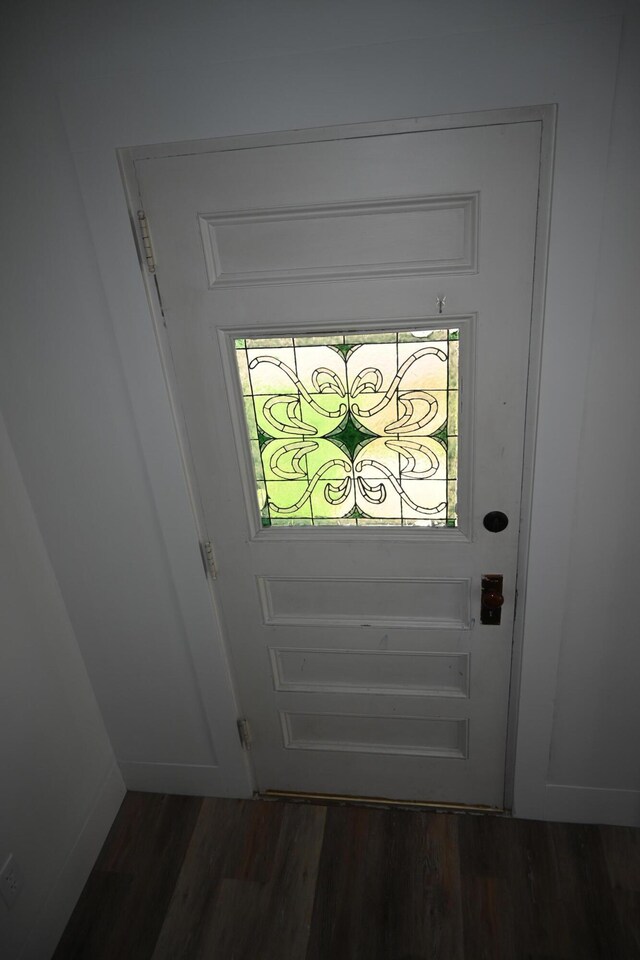 12 Preble St, Bingham, ME 04920 - doorway to outside featuring dark wood-style floors