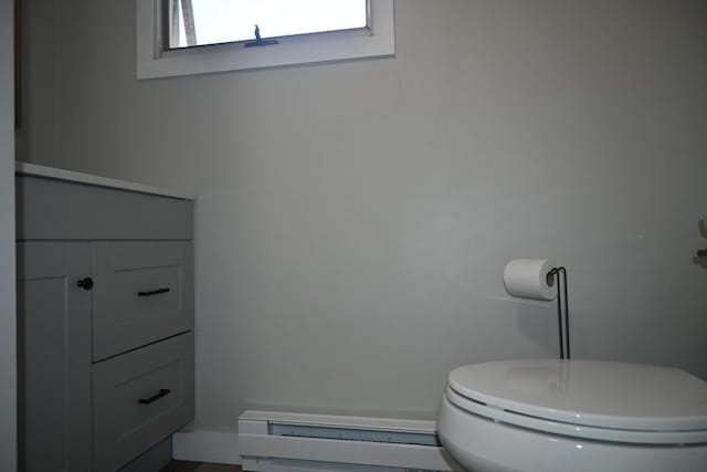 12 Preble St, Bingham, ME 04920 - bathroom with baseboard heating and vanity