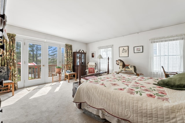 bedroom featuring access to outside and carpet flooring