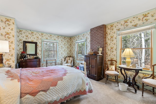 bedroom with crown molding, carpet flooring, and wallpapered walls