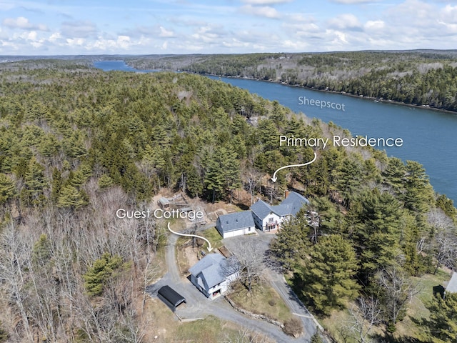 aerial view with a water view and a view of trees