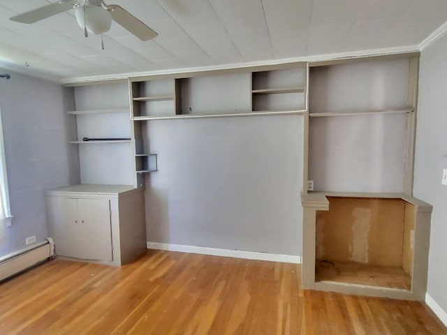 closet with a baseboard radiator