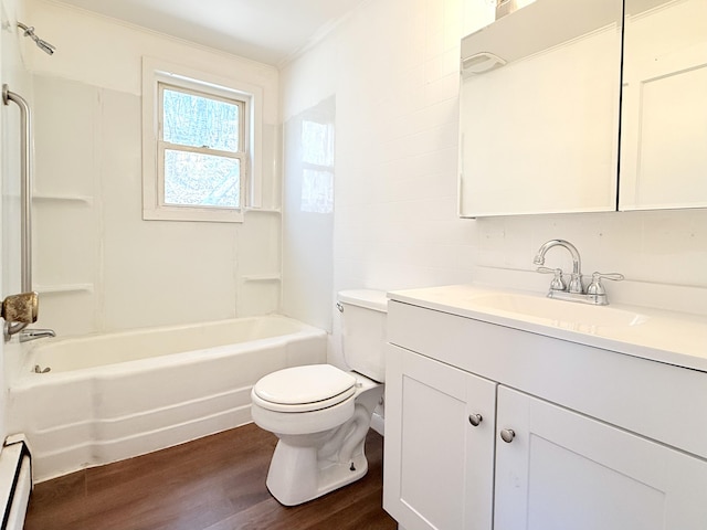 171 Granite St, Mexico, ME 04257 - bathroom featuring crown molding, wood finished floors, vanity, a baseboard radiator, and toilet