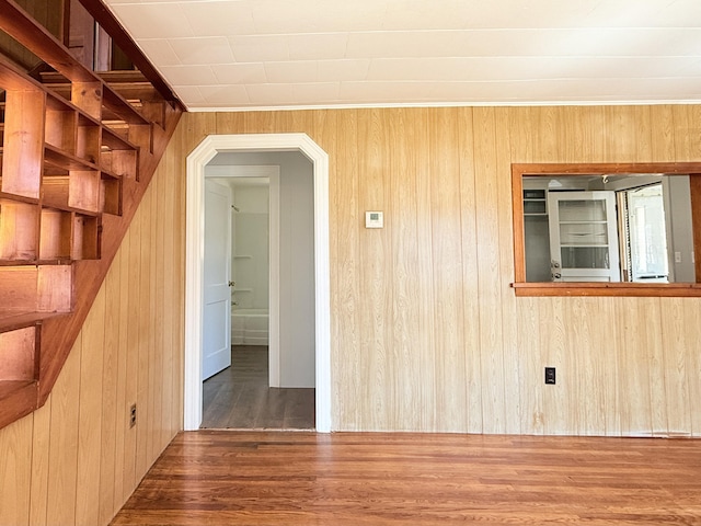 171 Granite St, Mexico, ME 04257 - spare room featuring wood walls, wood finished floors, and stairs