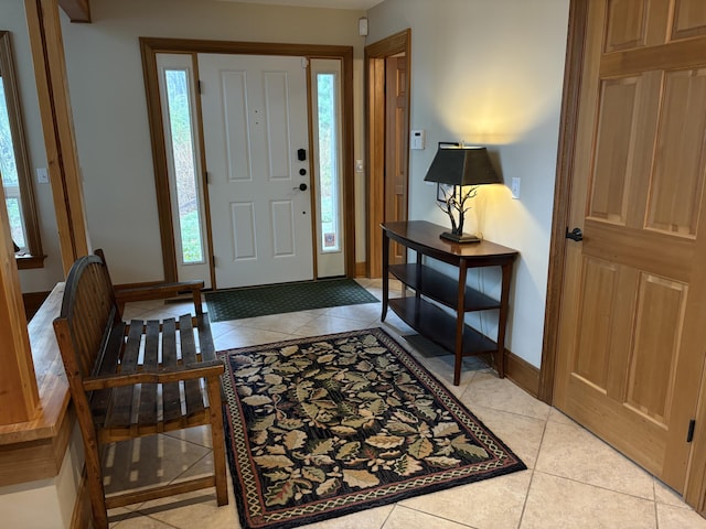 1 Mccracken Ln, Bristol, ME 04539 - foyer entrance with light tile patterned floors and baseboards