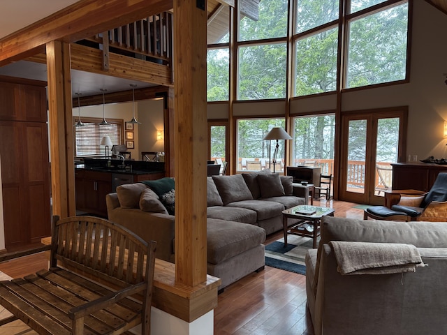 1 Mccracken Ln, Bristol, ME 04539 - living room featuring a high ceiling, hardwood / wood-style floors, and healthy amount of natural light
