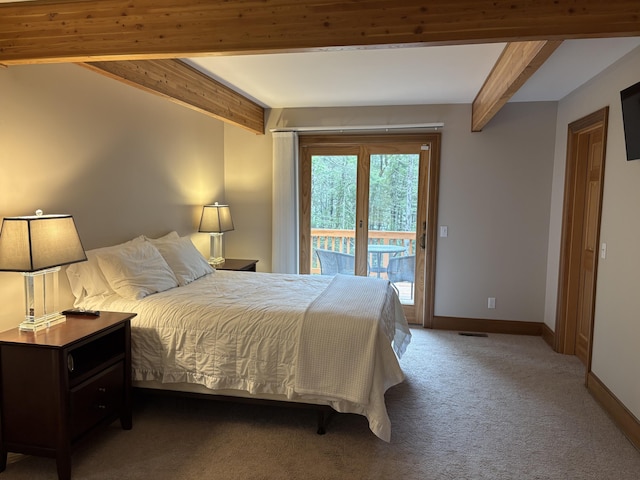 1 Mccracken Ln, Bristol, ME 04539 - carpeted bedroom featuring beamed ceiling, access to exterior, and baseboards