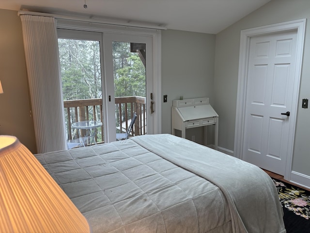 1 Mccracken Ln, Bristol, ME 04539 - bedroom featuring access to exterior, vaulted ceiling, and wood finished floors