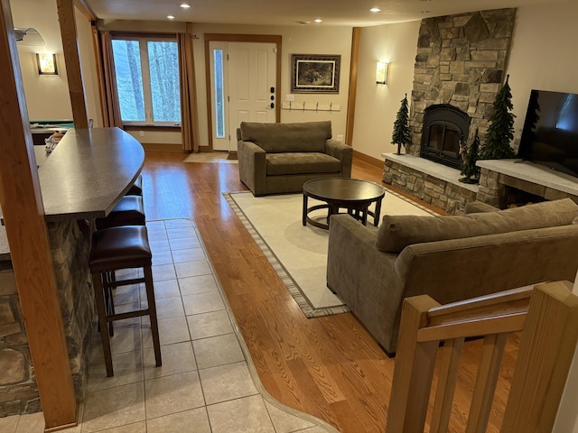 1 Mccracken Ln, Bristol, ME 04539 - living room featuring a stone fireplace, light wood-style floors, recessed lighting, and baseboards