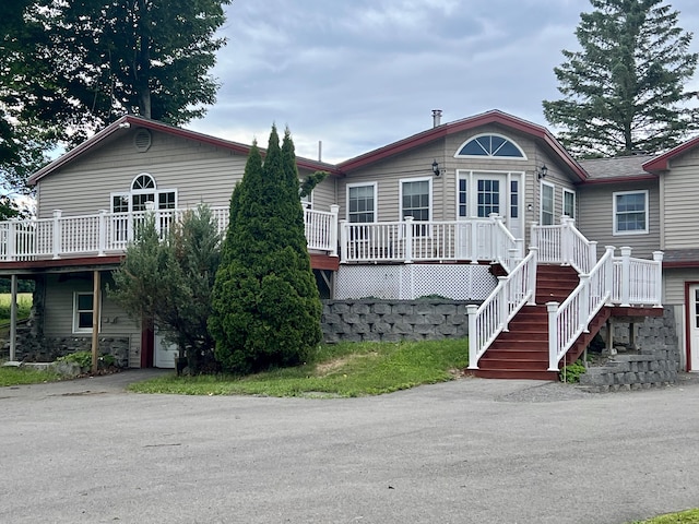 view of front of property with a deck