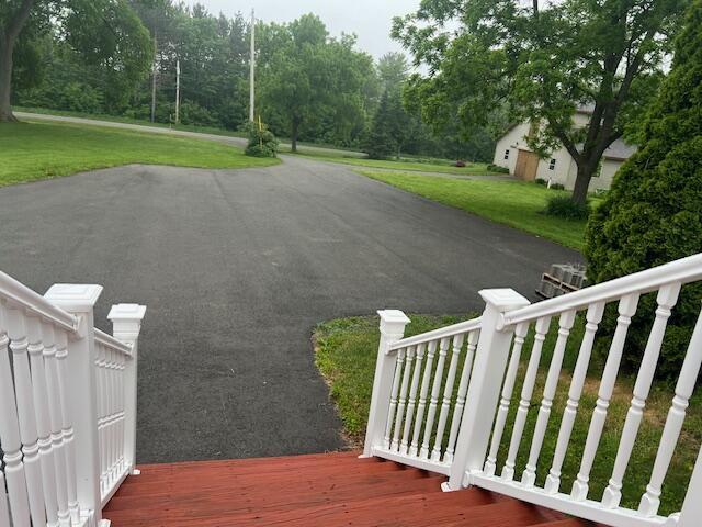view of street featuring driveway