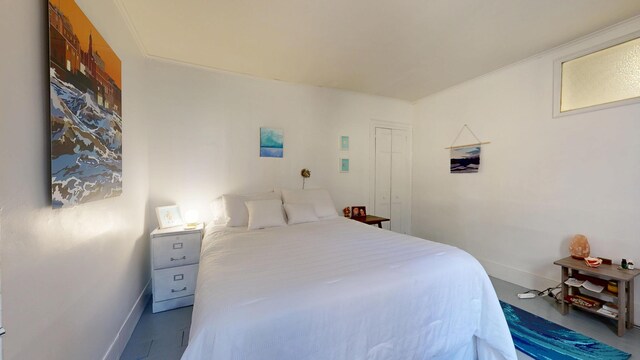 bedroom featuring baseboards