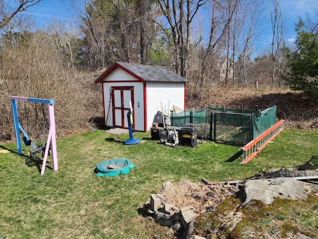 view of shed featuring fence