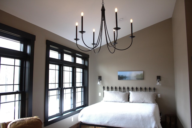 bedroom featuring a chandelier