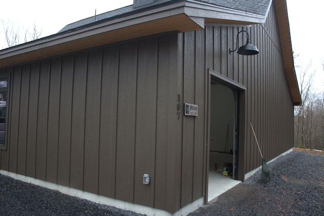 view of home's exterior featuring a shingled roof