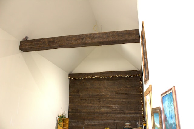 interior details featuring beamed ceiling