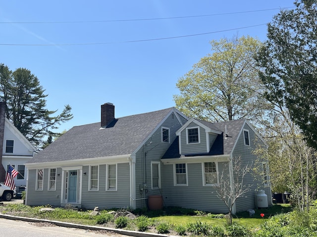 121 Jefferson St, Waldoboro, ME 04572 - cape cod-style house featuring a chimney and a shingled roof