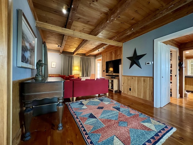 121 Jefferson St, Waldoboro, ME 04572 - bedroom featuring wood ceiling with exposed beams, wood-type flooring, a wainscoted wall, multiple windows, and wooden walls