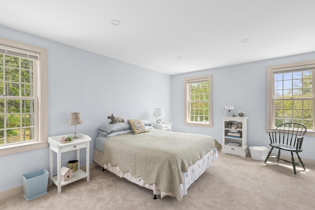 20 Campbell Rd, Southport, ME 04576 - bedroom featuring multiple windows, carpet flooring, and baseboards