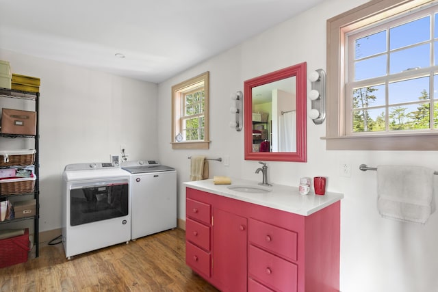 20 Campbell Rd, Southport, ME 04576 - laundry room featuring independent washer and dryer and wood finished floors