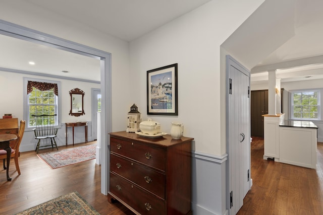 20 Campbell Rd, Southport, ME 04576 - corridor featuring ornate columns and dark wood-style flooring