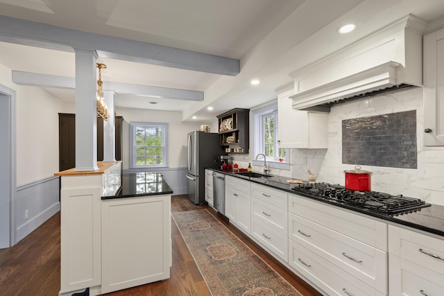 20 Campbell Rd, Southport, ME 04576 - kitchen featuring stainless steel appliances, a sink, dark countertops, dark wood finished floors, and open shelves