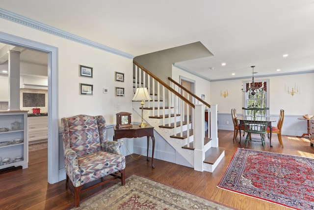 20 Campbell Rd, Southport, ME 04576 - staircase with wood finished floors, crown molding, recessed lighting, and wainscoting