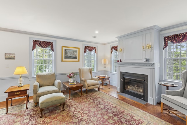 20 Campbell Rd, Southport, ME 04576 - sitting room with crown molding, plenty of natural light, light wood-style floors, and recessed lighting