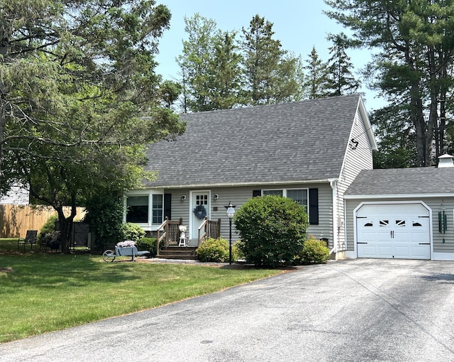 17 Fieldstone Dr, Bangor, ME 04401 - cape cod home with a garage, a shingled roof, driveway, and a front lawn