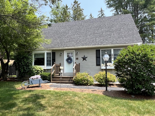17 Fieldstone Dr, Bangor, ME 04401 - cape cod-style house featuring roof with shingles and a front yard