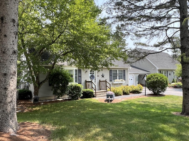 17 Fieldstone Dr, Bangor, ME 04401 - view of property hidden behind natural elements featuring a front lawn