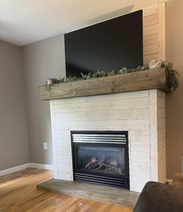 17 Fieldstone Dr, Bangor, ME 04401 - detailed view of a fireplace and wood finished floors