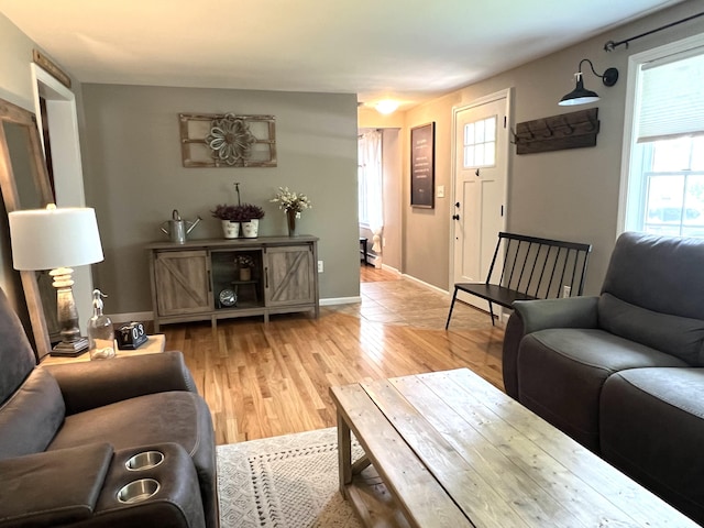 17 Fieldstone Dr, Bangor, ME 04401 - living room with plenty of natural light and light wood-type flooring