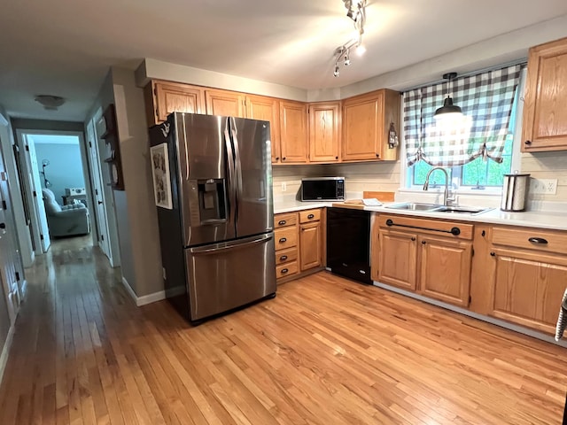 17 Fieldstone Dr, Bangor, ME 04401 - kitchen with appliances with stainless steel finishes, light wood-style flooring, light countertops, and light brown cabinets